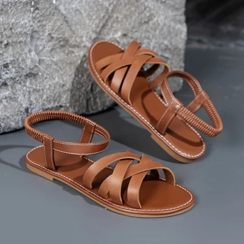 Новые летние женские босоножки в римском стиле с ремешком на плоской подошве и нескользящей резиновой подошвой, модная женская обувь